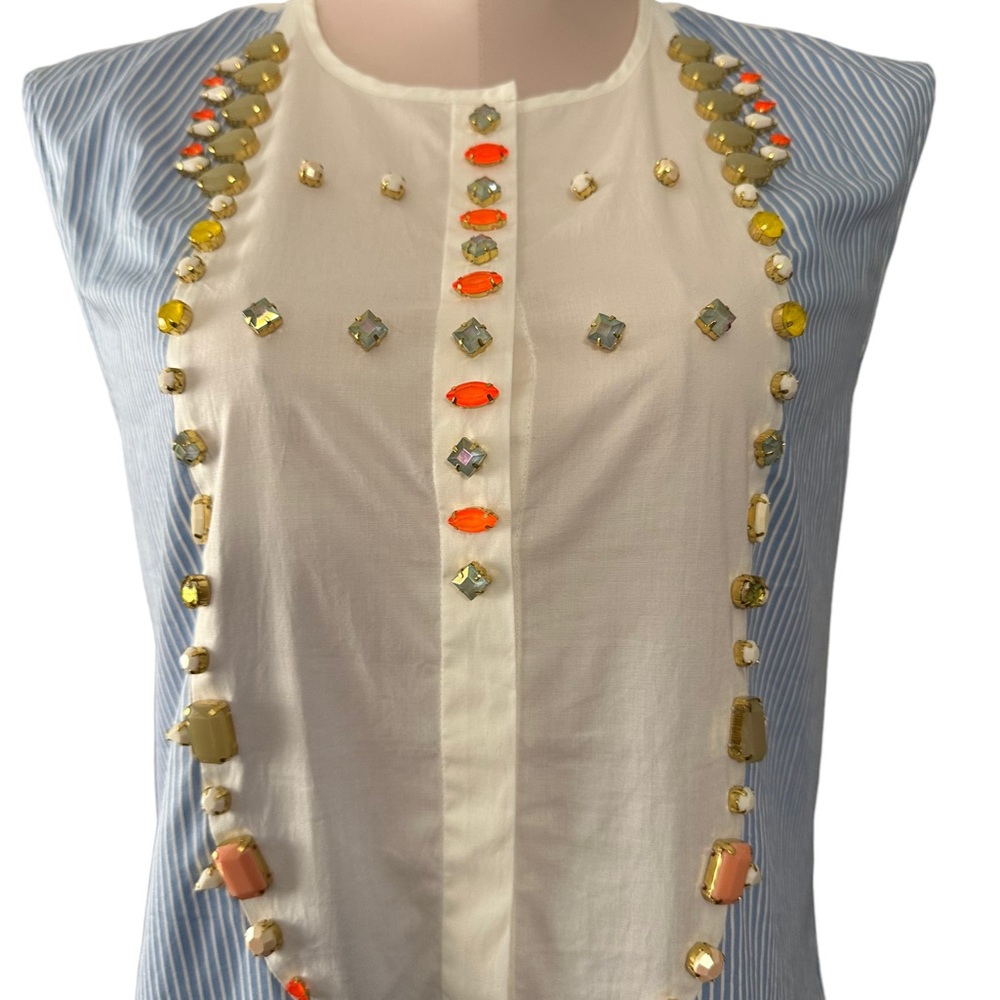 J Crew top in size 2. Sleeveless. gorgeous embellishment. No stones missing.